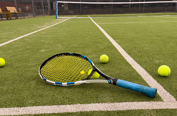 Quel prix construction terrain de tennis prévoir en région pluvieuse ?